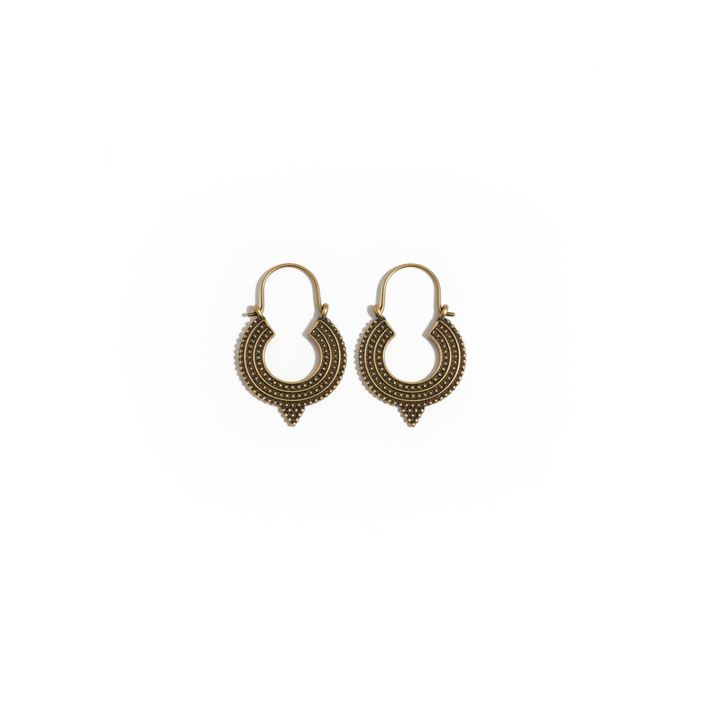 Boucles bronze sur fond blanc