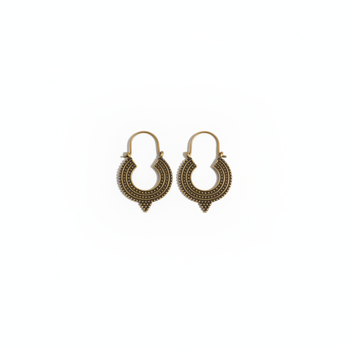 Boucles bronze sur fond blanc