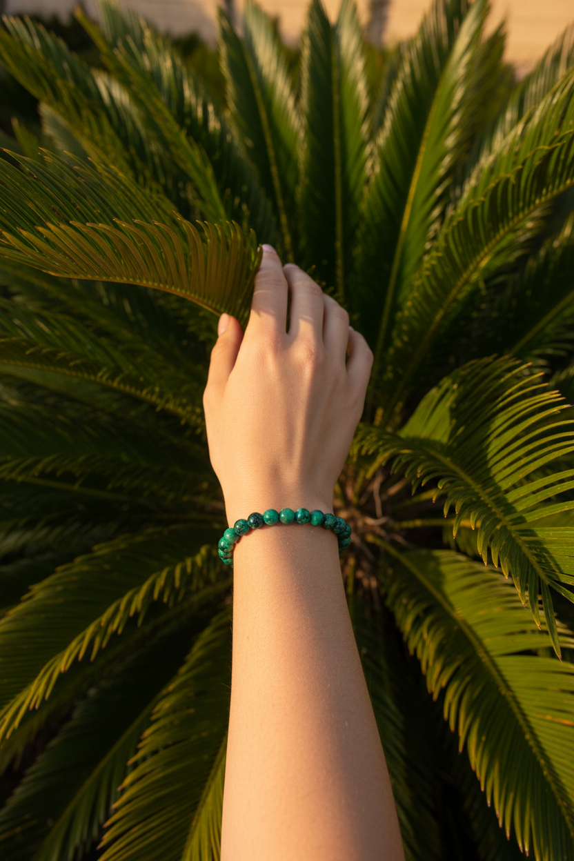 Bracelet émeraude avec feuilles de palmier