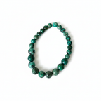Bracelet perles graduées — fond blanc studio