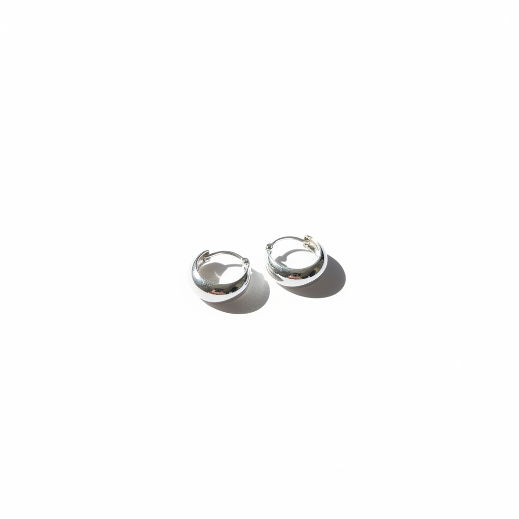 Silver hoop earrings — studio white